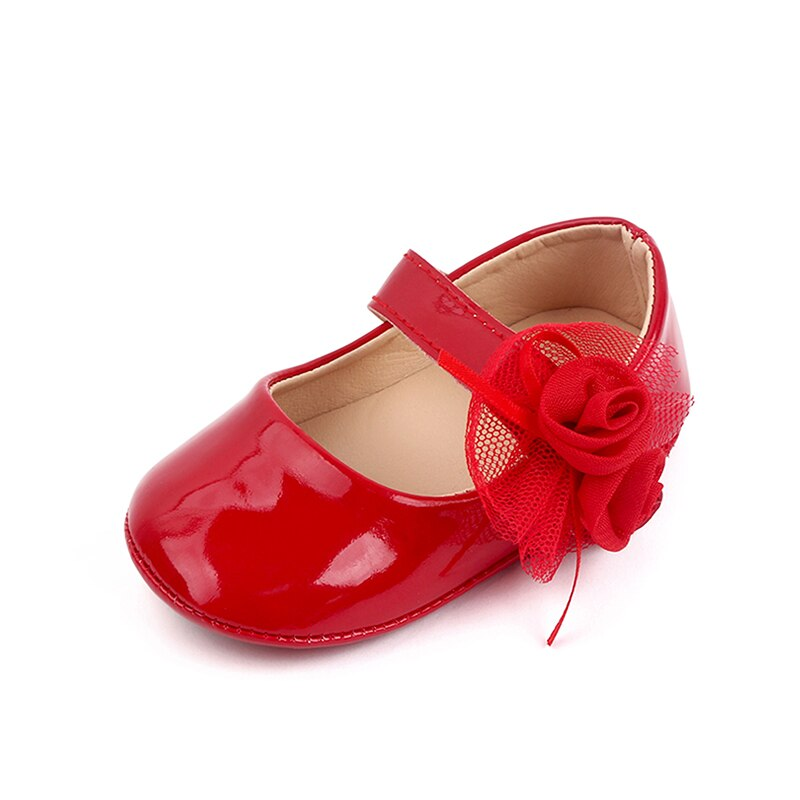 Zapatos de bebé con flor