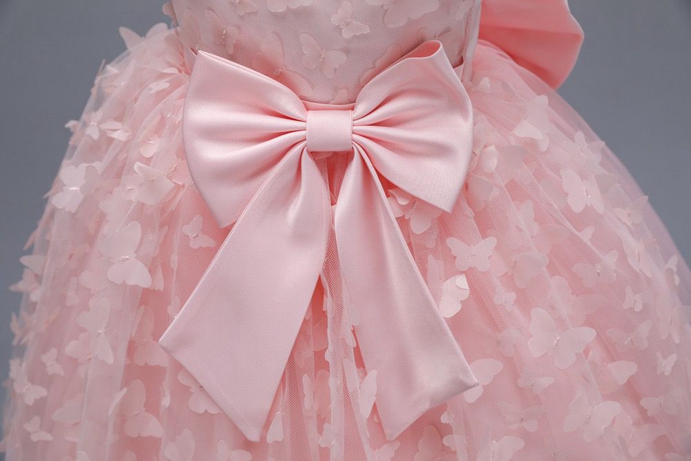 Vestido infantil con mariposas y lazo
