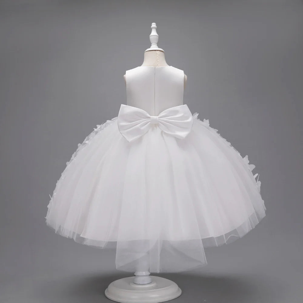 Vestido infantil con mariposas y lazo