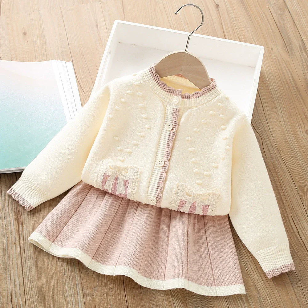 Conjunto de punto con lazo plisado para niña