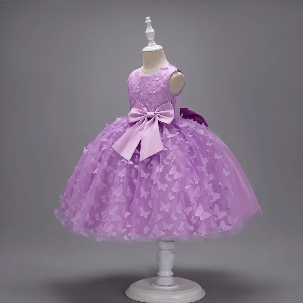 Vestido infantil con mariposas y lazo