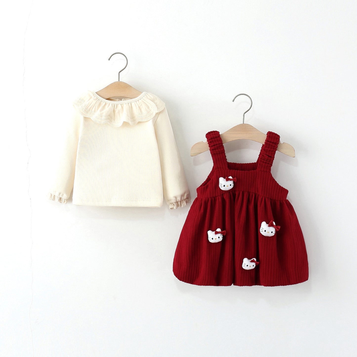 Children's blouse and dress with kitten print.