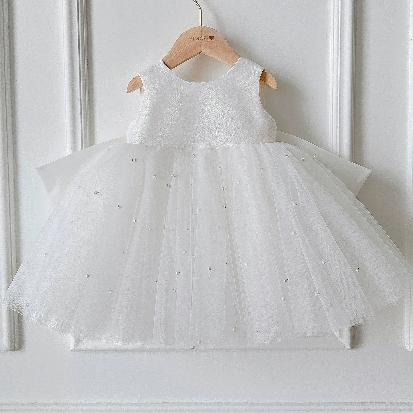 Children's Dress with Ruffles and Bow Hem
