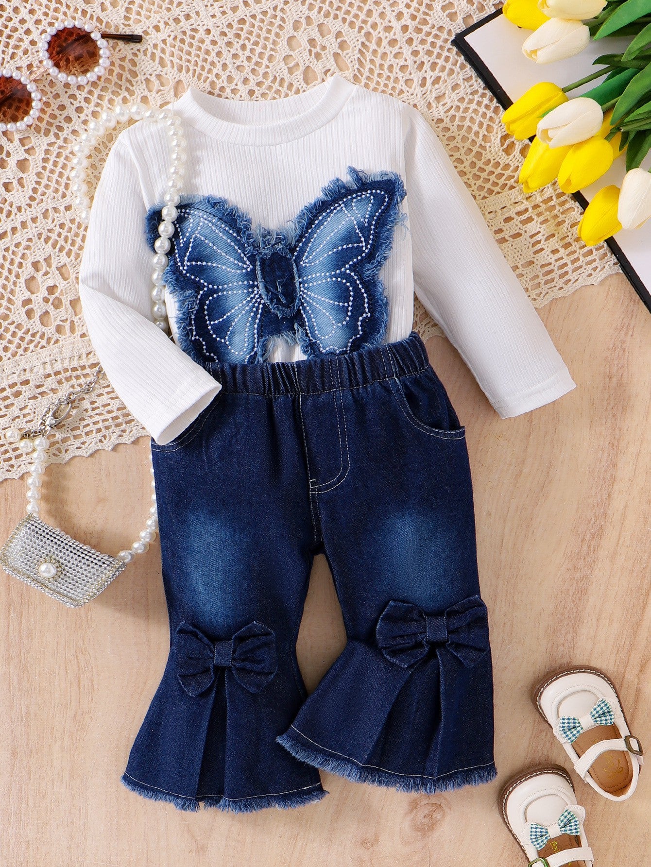 Conjunto de mariposa y vaqueros para niña