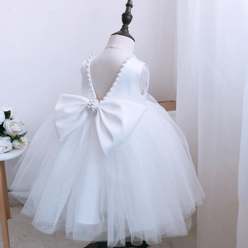 Vestido infantil de tul con piedras y lazo