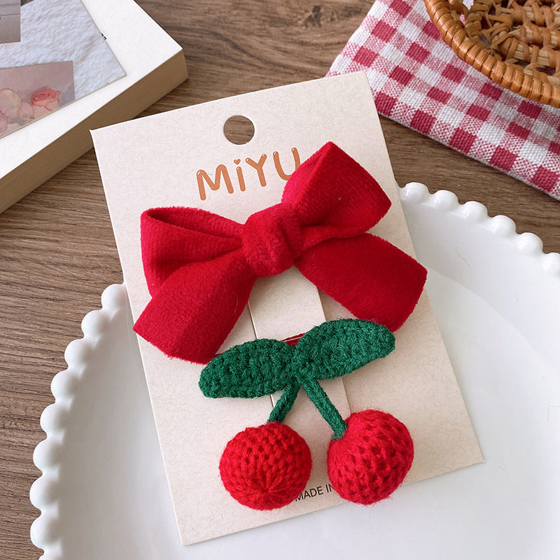 Clips para niños con lazos rojos