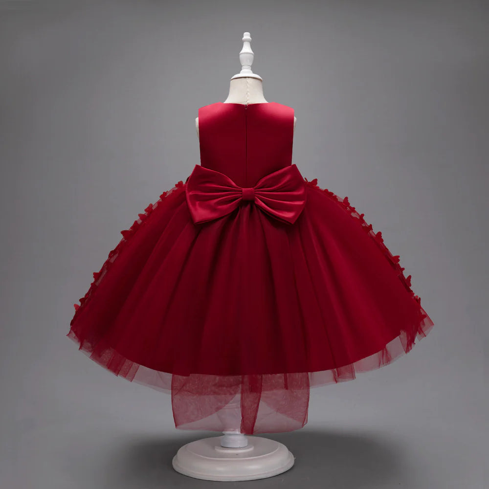 Vestido infantil con mariposas y lazo