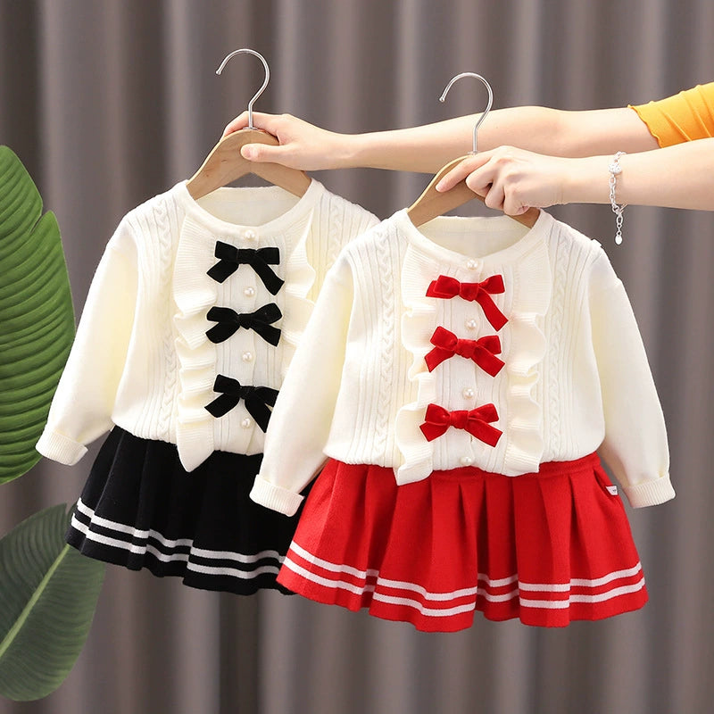 Conjunto de punto con lazo para niña