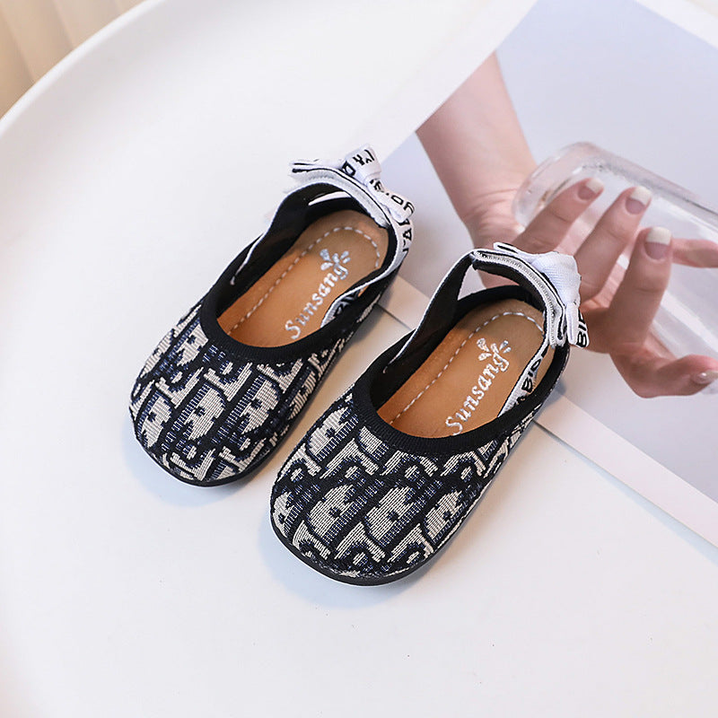 Zapatos de niña con lazo