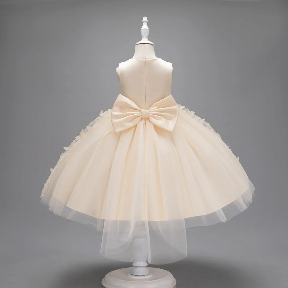 Vestido infantil con mariposas y lazo