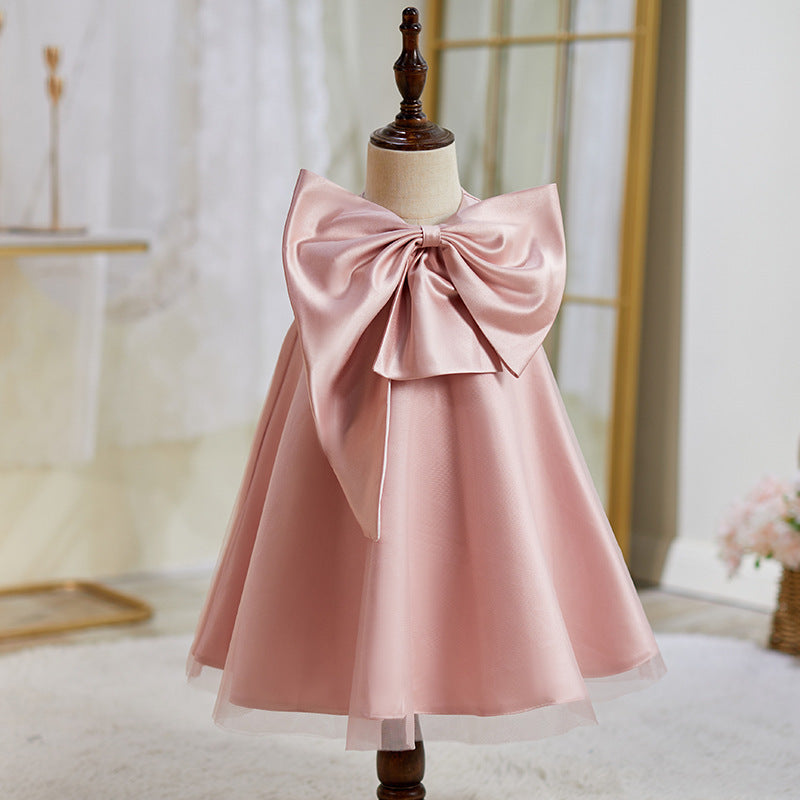 Vestido infantil con lazo rosa