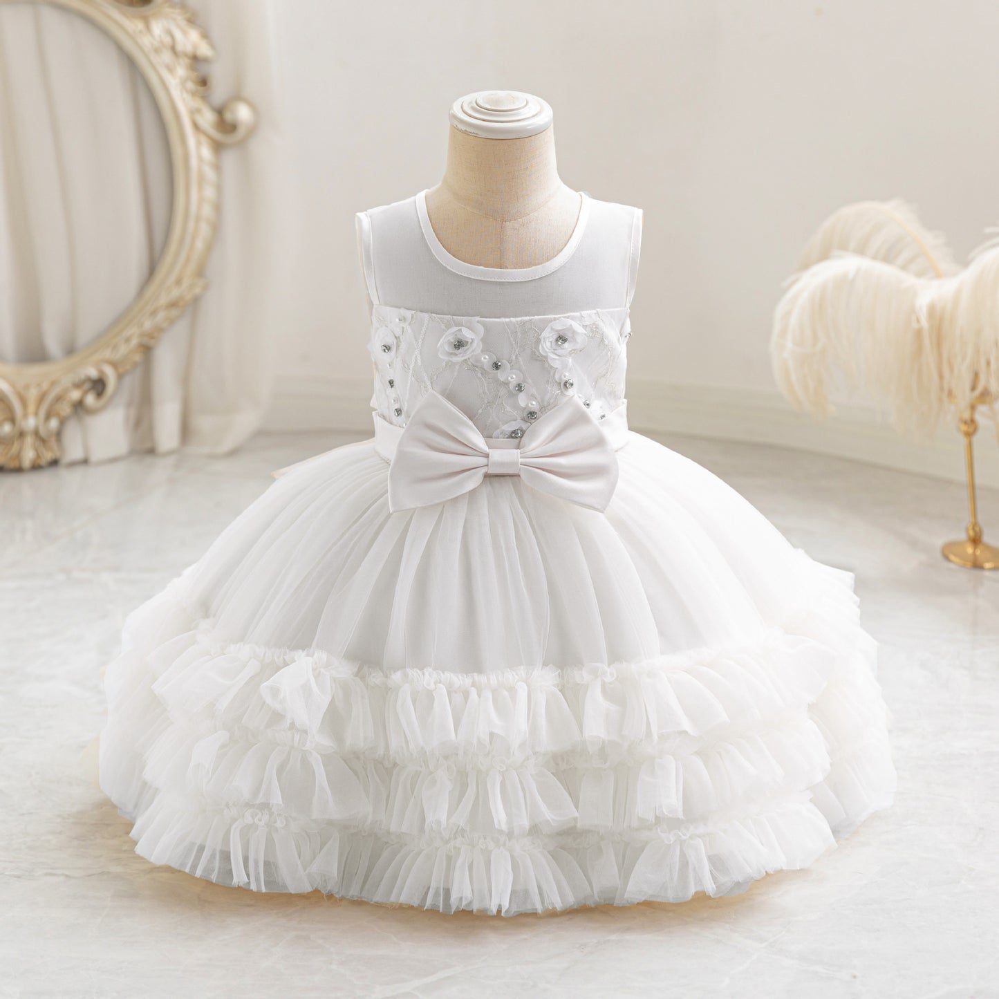 Vestido de fiesta infantil en capas de tul y lazo