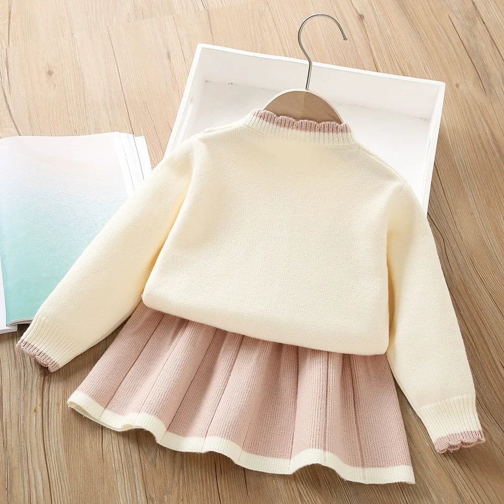 Conjunto de punto con lazo plisado para niña