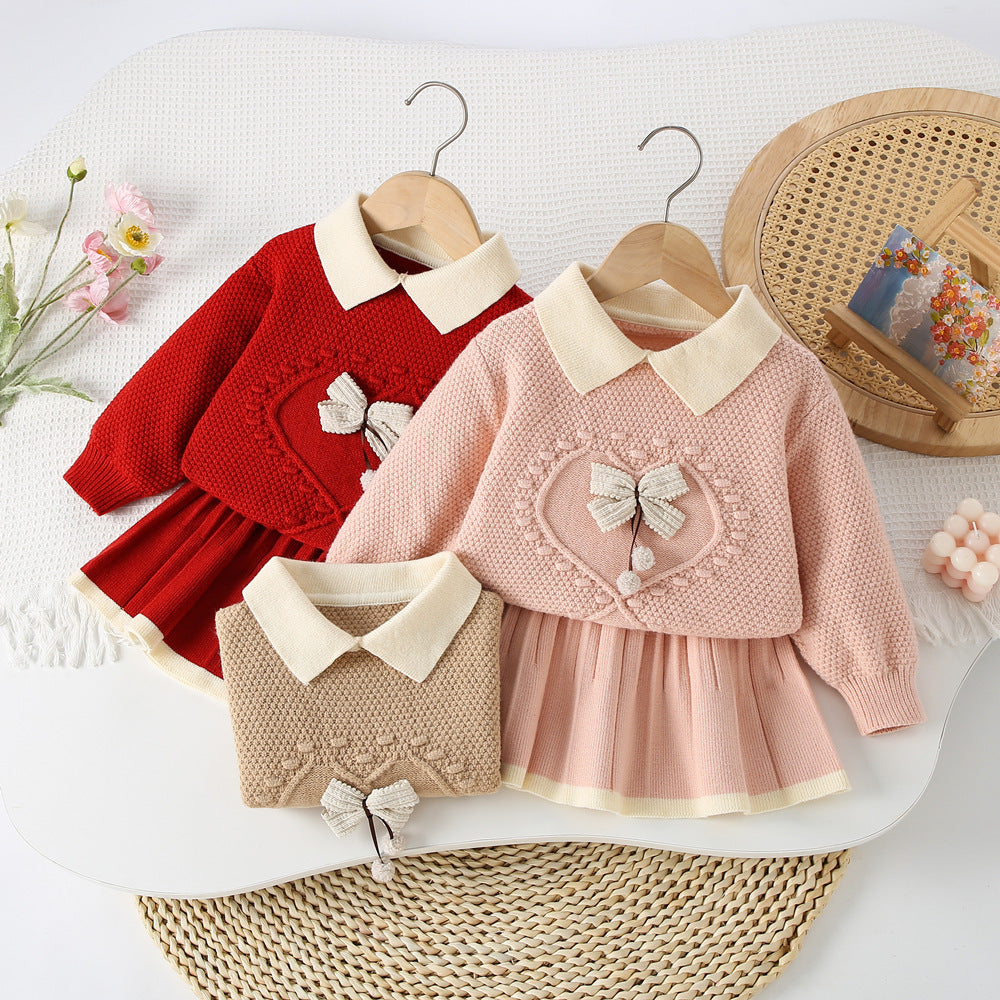 Conjunto de punto con lazo delicado para niña
