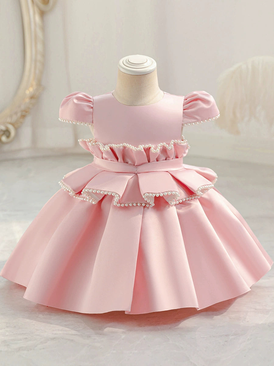 Vestido de fiesta abullonado con perlas