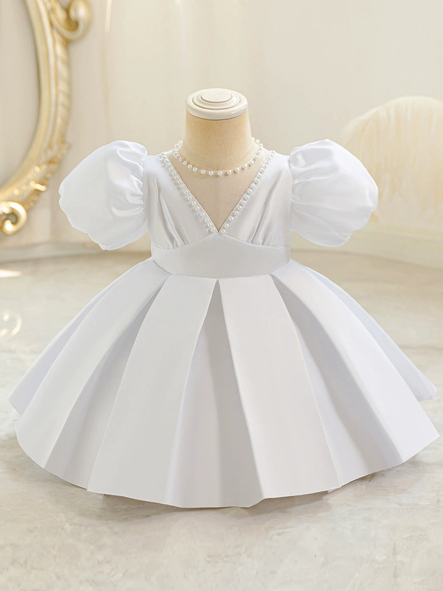 Vestido de fiesta abullonado con perlas