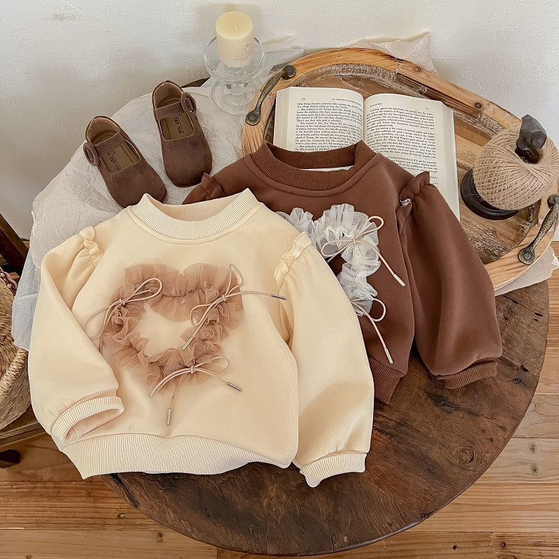 Blusa infantil para mujer con detalle de cordón