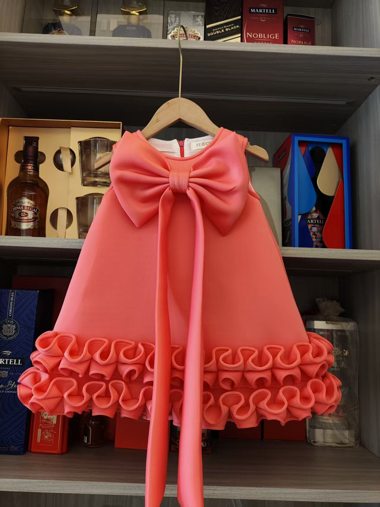 Children's Dress with Ruffles and Bow Hem