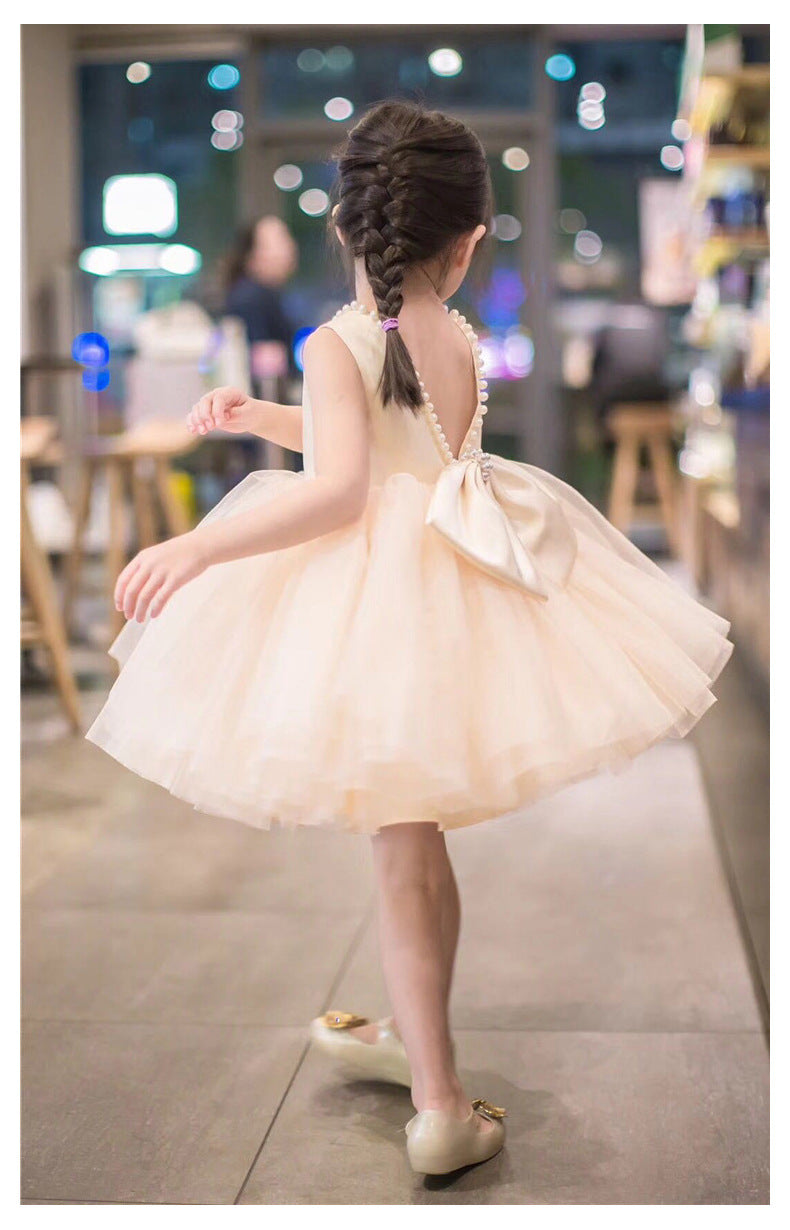 Vestido infantil de tul con piedras y lazo
