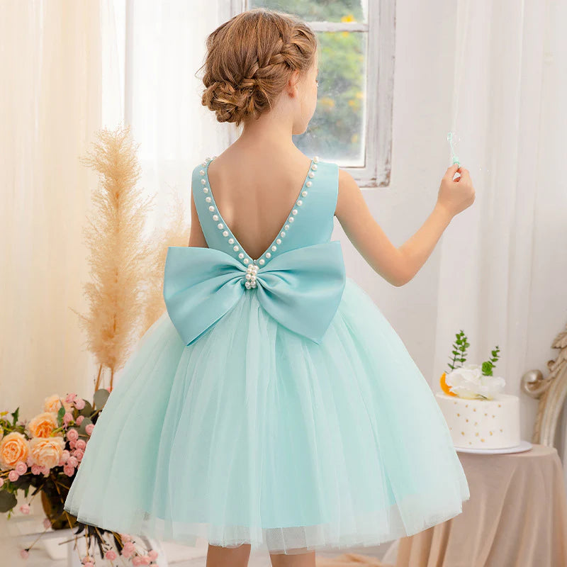 Vestido infantil de tul con piedras y lazo