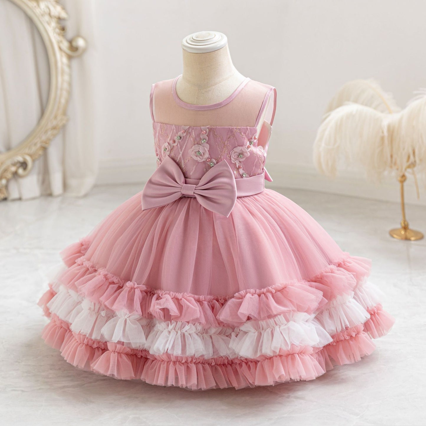 Vestido de fiesta infantil en capas de tul y lazo