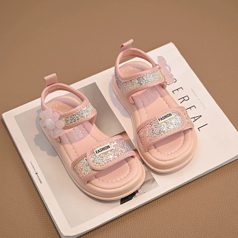 Sandalias infantiles con flores brillantes