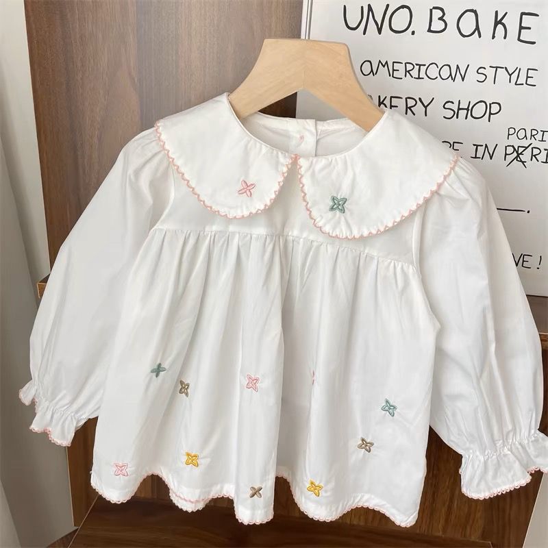 Camisa blanca para bebé niña con estrellas