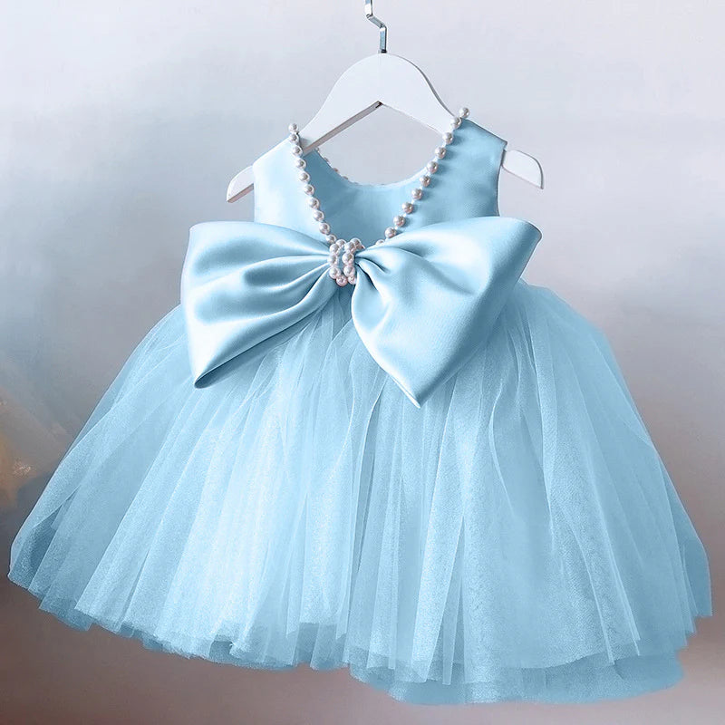 Vestido infantil de tul con piedras y lazo