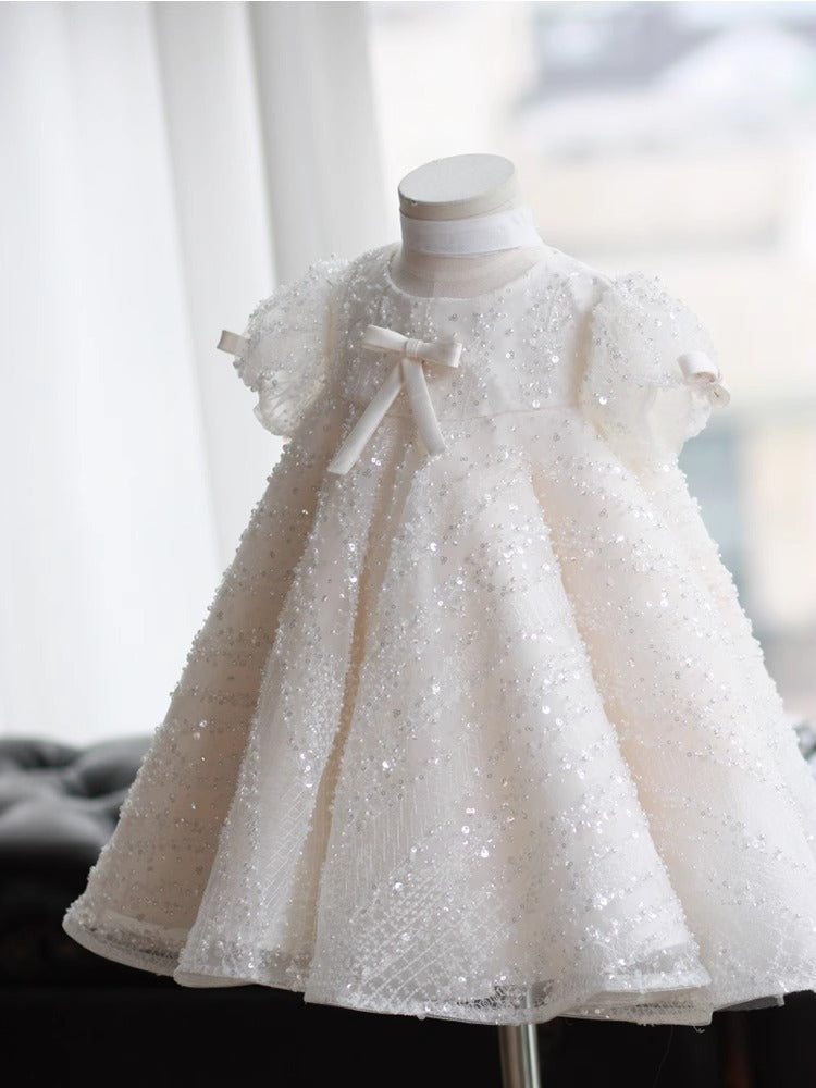 Vestido infantil con lazo brillante
