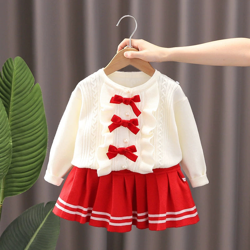 Conjunto de punto con lazo para niña