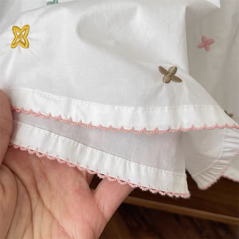 Camisa blanca para bebé niña con estrellas