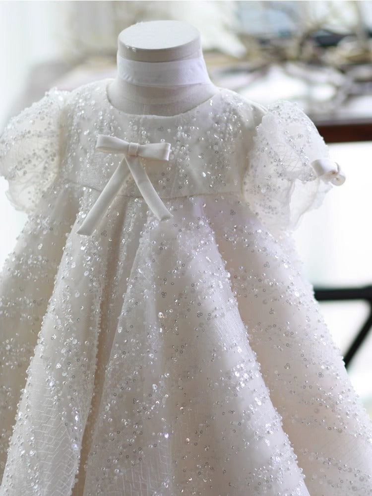 Vestido infantil con lazo brillante