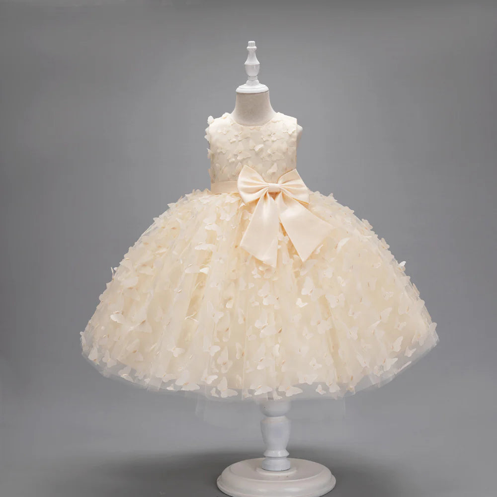 Vestido infantil con mariposas y lazo