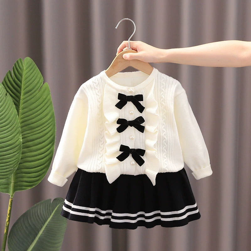 Conjunto de punto con lazo para niña