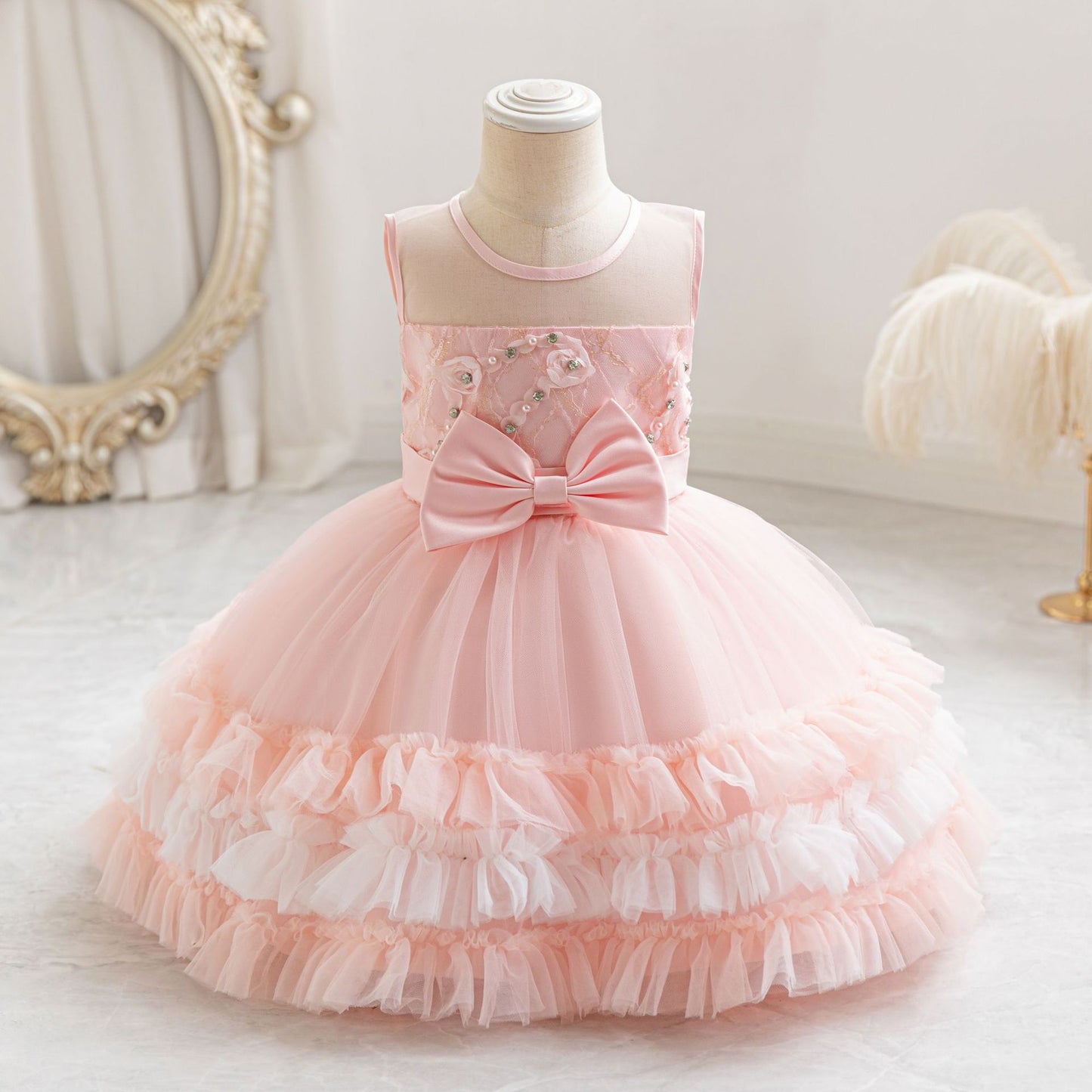 Vestido de fiesta infantil en capas de tul y lazo