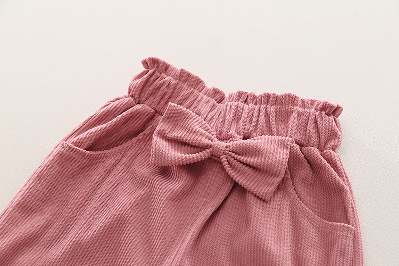 Conjunto infantil de mujer con botones de lazo