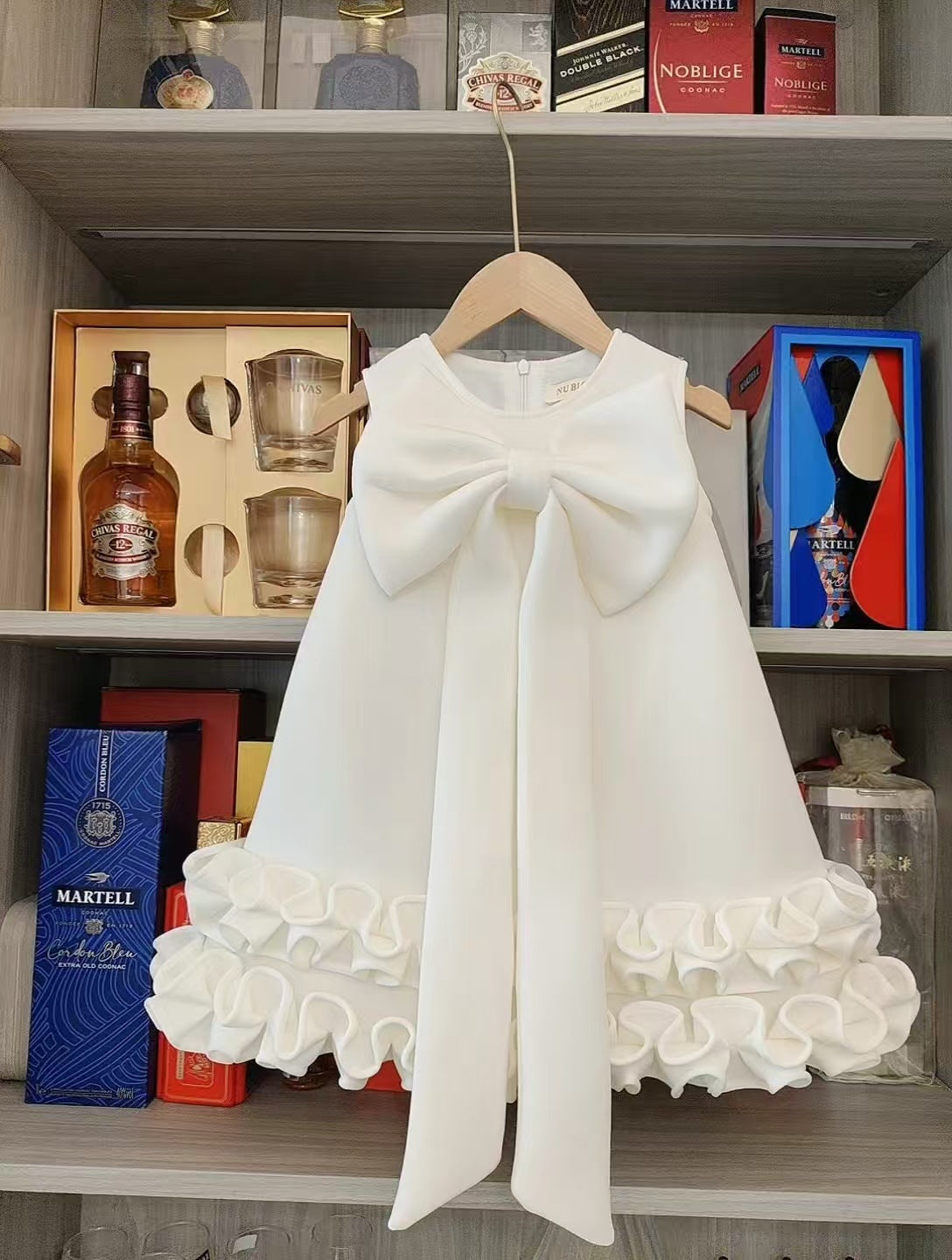 Children's Dress with Ruffles and Bow Hem