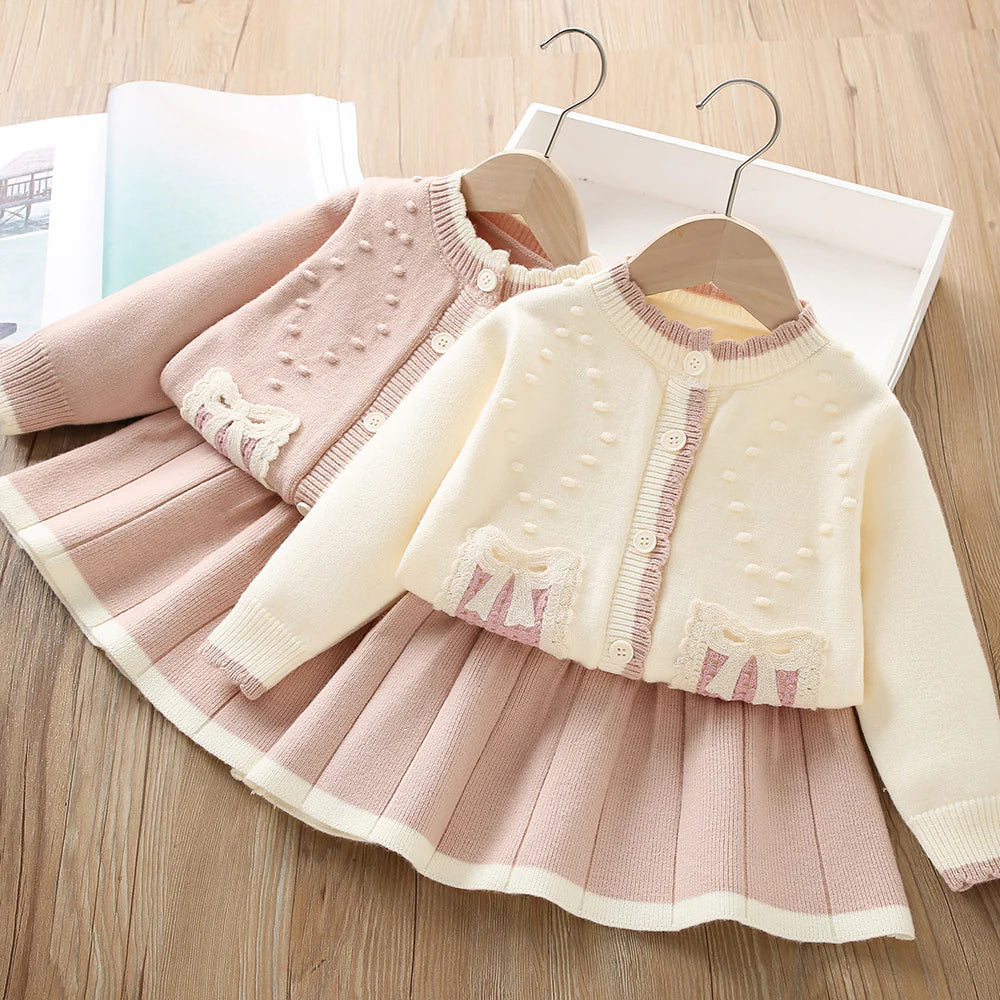 Conjunto de punto con lazo plisado para niña