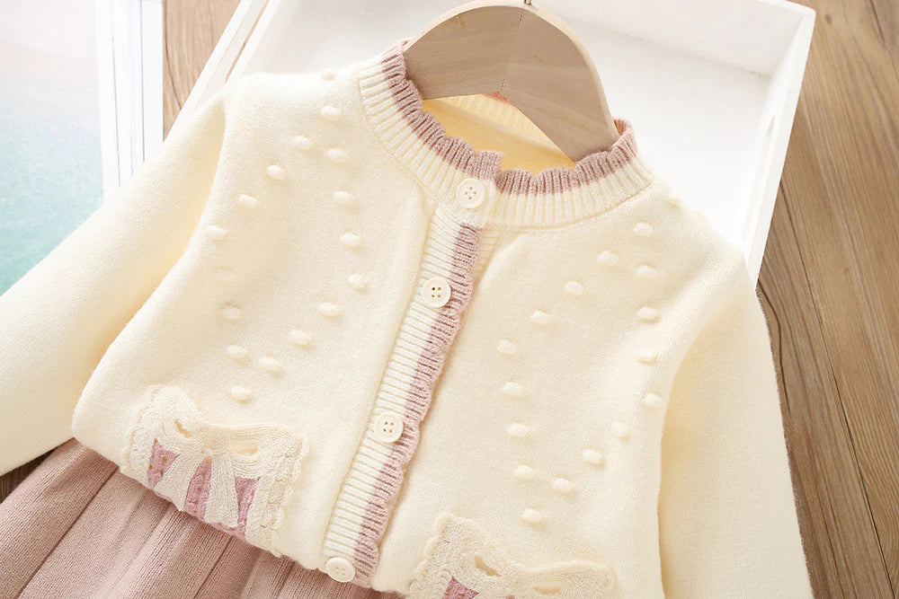 Conjunto de punto con lazo plisado para niña