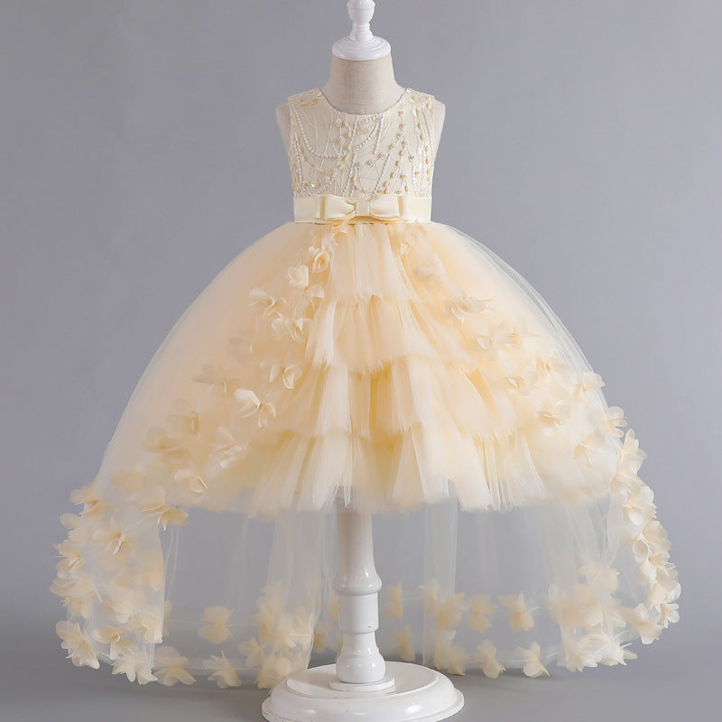 Vestido de fiesta infantil con flores brillantes y lazo