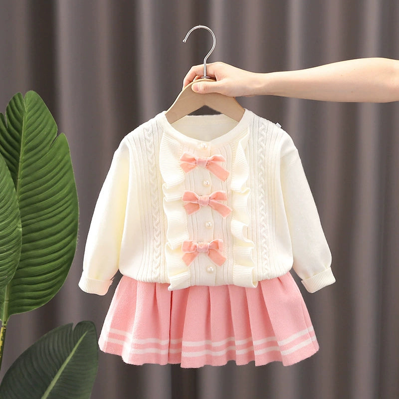 Conjunto de punto con lazo para niña