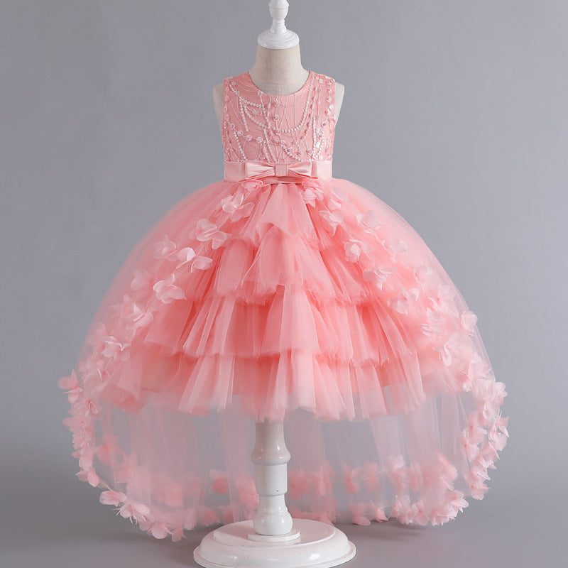 Vestido de fiesta infantil con flores brillantes y lazo