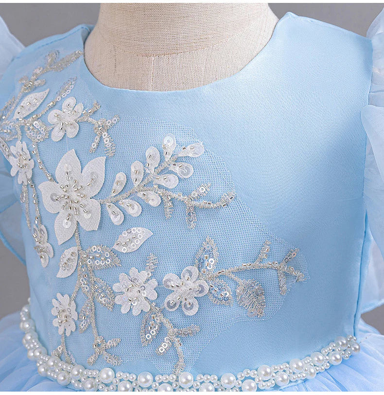 Vestido de fiesta infantil con flores y mangas voladoras