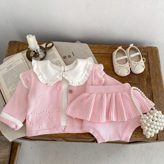 Conjunto infantil de punto rosa para niña