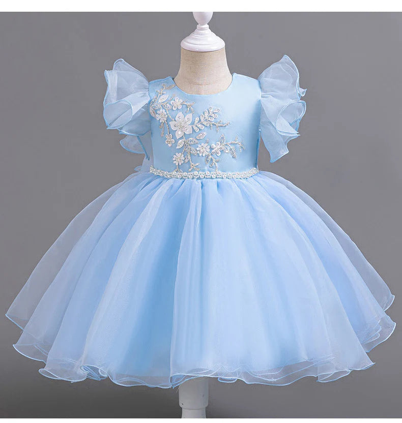Vestido de fiesta infantil con flores y mangas voladoras