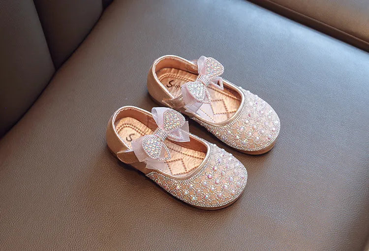 Zapatos de lazo brillante para niños