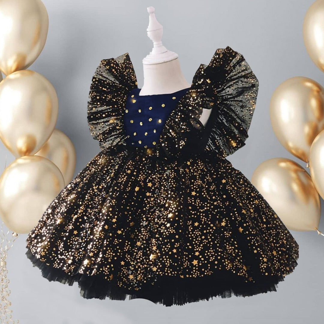 Vestido de fiesta infantil con tul y estrellas