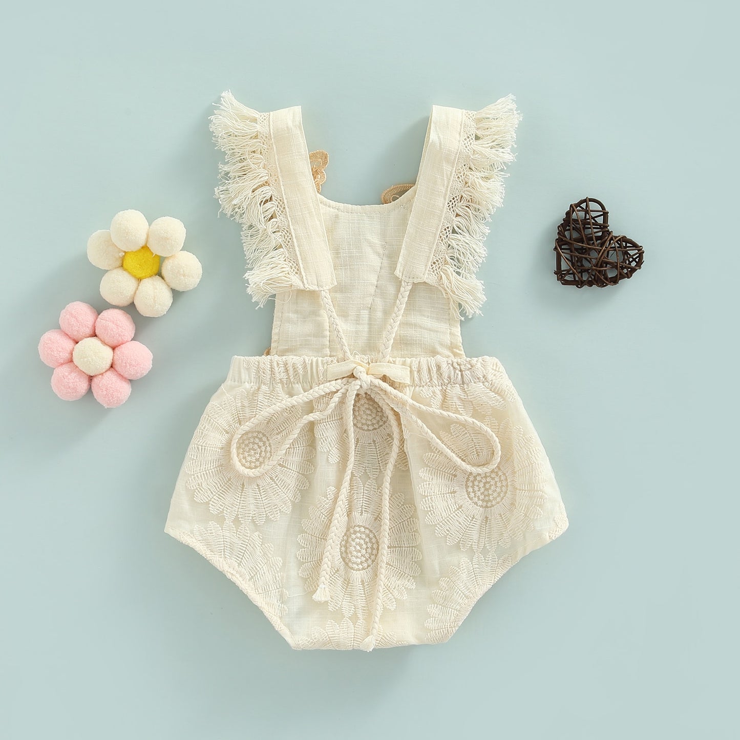 Body infantil beige con mariposa