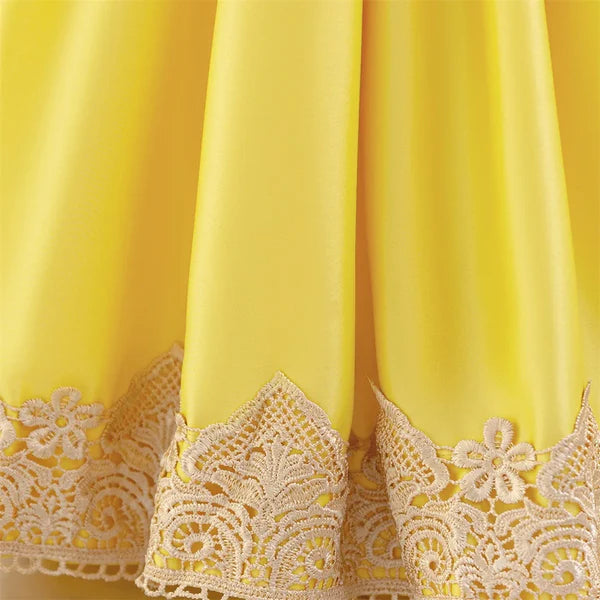 Party dress with flowers and a bow.