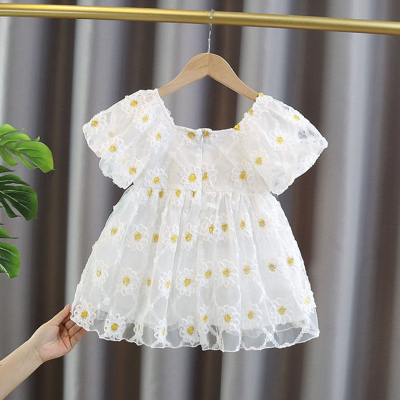 Vestido infantil con lazo amarillo